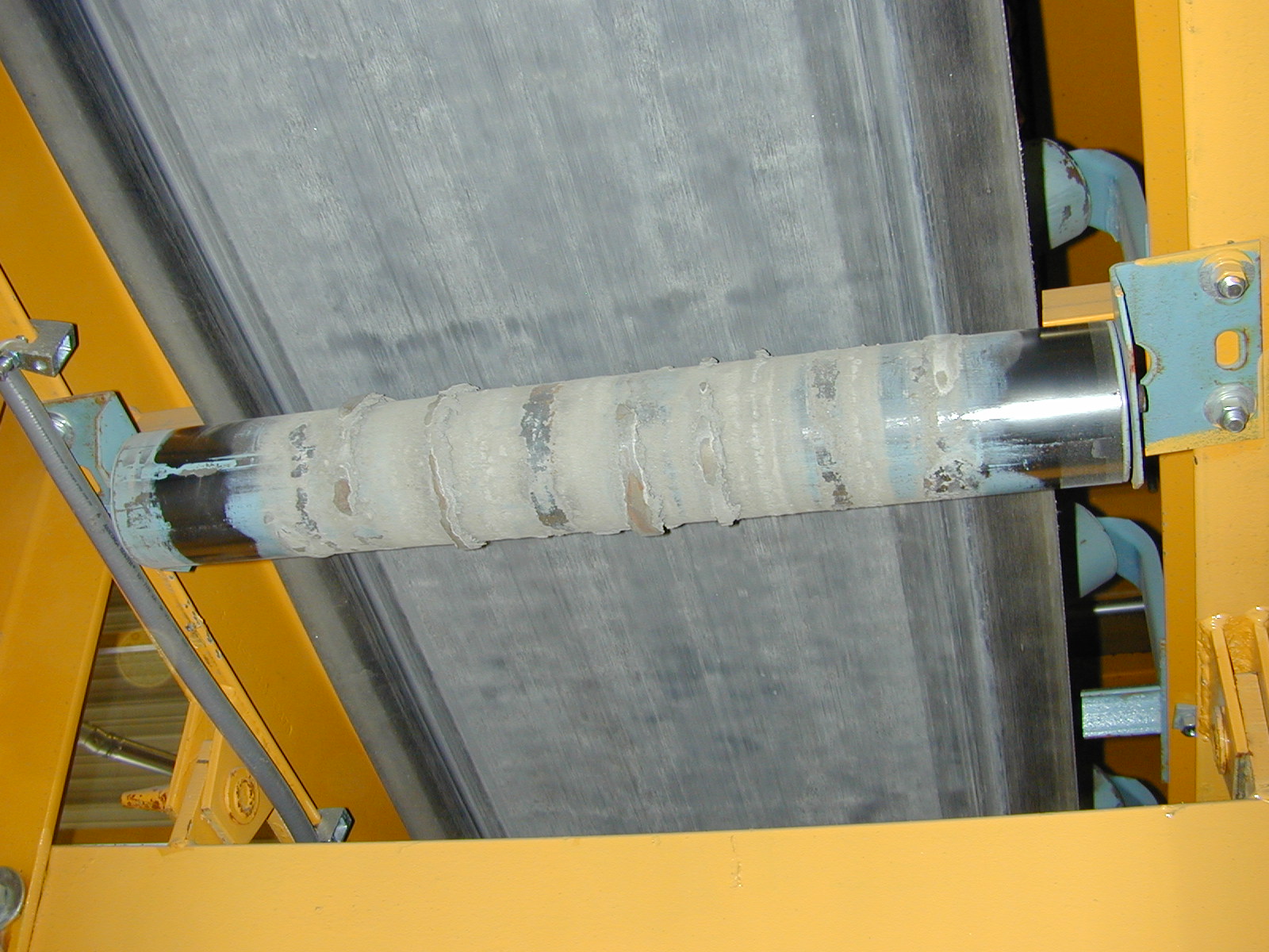 Corroded structural steel showing scale at connections